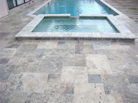 Home outdoor design pool deck and patio trends. Pool with silver travertine | Travertine pool coping, Pool ...