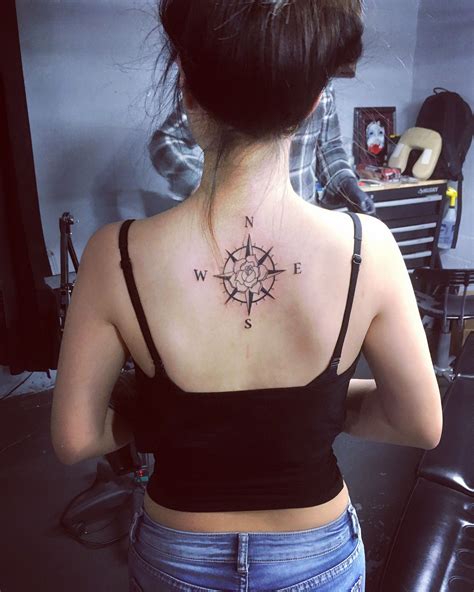 This tattoo design is not as popular as red or black rose, but it definitely great if you want to express optimism and passion. Compass rose tattoo. Back neck. Small tattoo. | tatoo ...