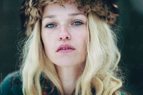 Portrait Of A Beautiful Woman With Freckles And Blue Eyes Del