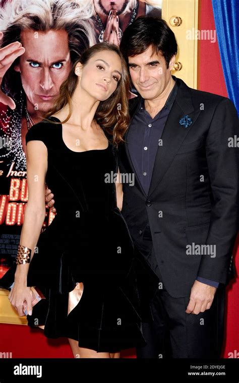 David Copperfield And Chloe Gosselin Attend The Premiere Of Warner Bros