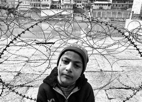 کشمیر میں زندگی کیمرے کی آنکھ سے Bbc News اردو Almond Blossom Barbed Wire Cruel