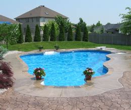 Stamped concrete allows you to pave a walkway or driveway to make it look like brick or stone but with the practicality of concrete. Stamped Concrete Pool Decks in Lansing, Michigan