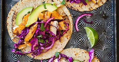 These grilled fish tacos are easy and healthy and made with cilantro, cabbage, lime, and a splash of tequila for good measure. 10 Best Fish Tacos with Cabbage Slaw Recipes