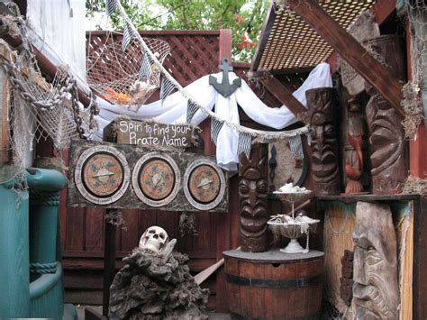 An Outdoor Area With Various Items And Decorations On The Walls