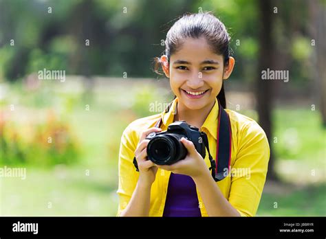 Happy 1 Indian Young Girl Photographer Camera Photography In Park Stock