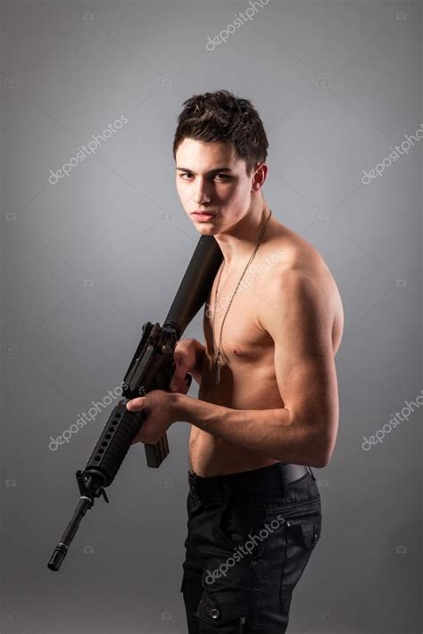Bare Chested Soldier With Rifle Stock Photo By ©bloodua 56251945