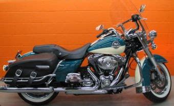 With wide chrome beach bars, wire wheels wrapped in whitewall tires, a sweeping rear tail, and extended chrome fishtails, one would except this road king built by afterhours bikes to be cruising denim jackets for men are making a comeback. 2009 Harley Davidson FLHRC Road King Classic