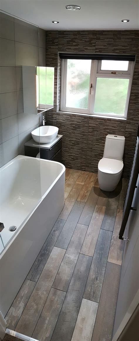 These slate effect tiles are suitable for both walls and floors an can be used throughout your home. Vintage floor board effect floor tile. | Tile bathroom ...
