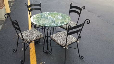 Comes with 36 glass top. Pier 1 Wrought Iron Dining/kitchen Table, Glass Top and 4 ...