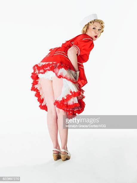 Woman Showing Off Legs Photos Et Images De Collection Getty Images