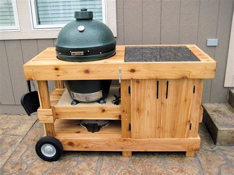If you love your big green egg or kamado joe, then give it a good home to hang out in. Double cabinet with shelf beneath BGE | Big green egg table, Big green egg table plans, Big ...