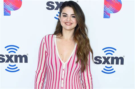Selena Gomezs Candy Striped Maxi Dress Is The Perfect Look For Fall Billboard Billboard