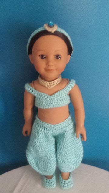 This crochet 18″ doll dress is worked in a simple striped pattern with a pretty ruffled edge along the bottom. Pin on 18-inch dolls