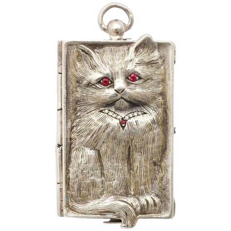 Silver Pendant of a Cuddlesome Kitty with Ruby Eyes | 1stdibs.com | Cat ...