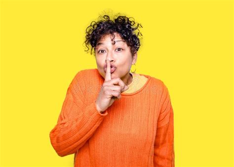 Black Woman Asking For Silence Gesture Promising To Keep Secret Stock