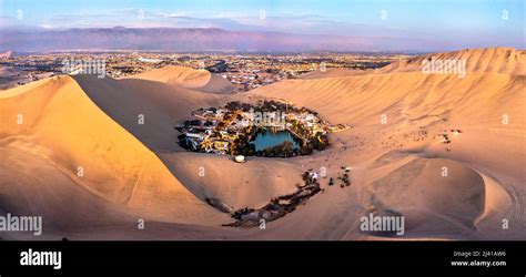 Aerial Sunset View Of The Huacachina Oasis In The Atacama Desert Of