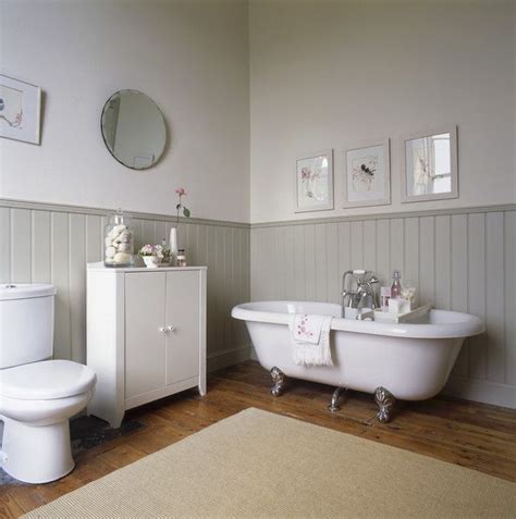 The wall frames look stunning against the colour, and you can complement the tones further with muted, simple furniture that is. Painted Panelling Photos | Paneling makeover, Bathroom ...