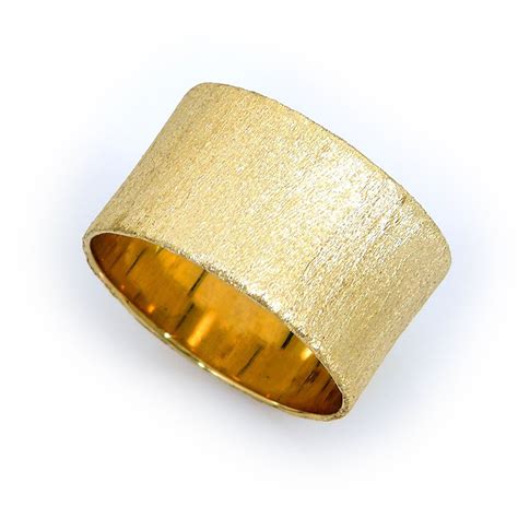 For deeper scratches jeweler's rouge compound can be used. 25 SCRATCHED Yellow gold band http://www.etsy.com/listing ...