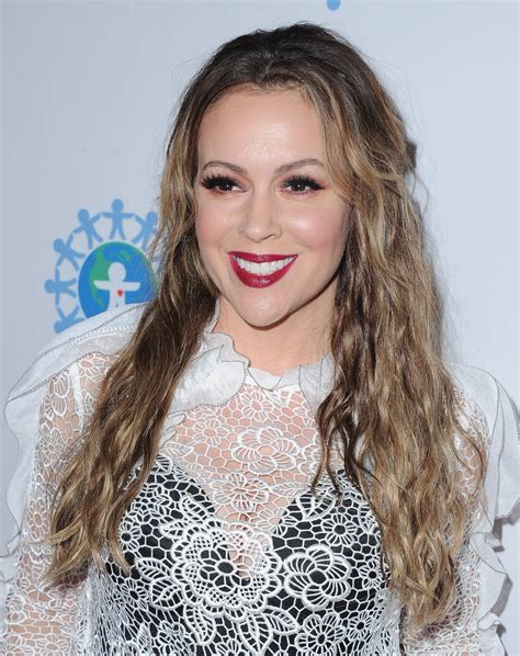 Milano was sitting in the passenger seat of a. ALYSSA MILANO at World of Children Hero Awards in Los ...