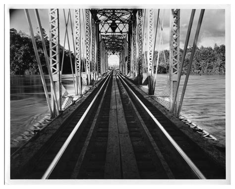 [Photograph of Railroad Bridge Crossing Flooded Sabine River] - The ...