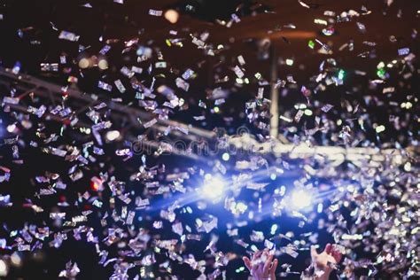 Colourful Confetti Explosion Fired On Dance Floor Air During A Concert