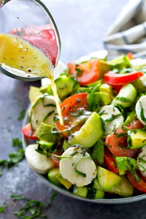 Snip over cress or sprinkle over basil. Italian Mozzarella Cucumber Tomato Avocado Salad