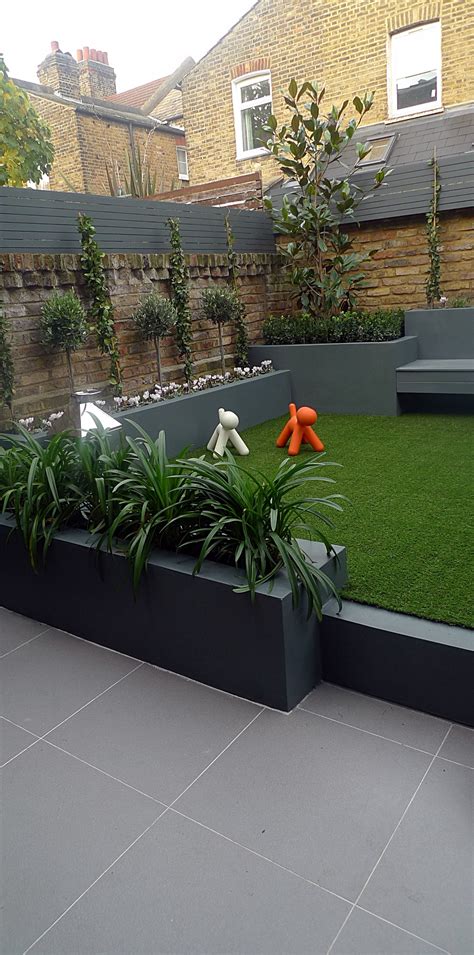 Grey colour scheme agapanthus olives artificial grass porcelain grey