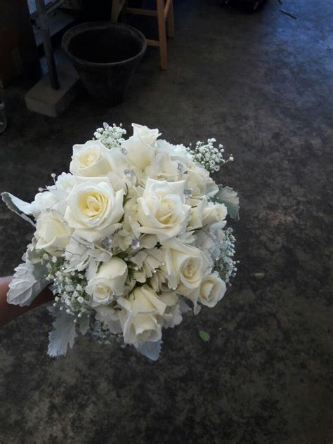 Collection by loretta berkland • last updated 10 hours ago. White bridal bouquet using white roses, hydrangea, baby's ...