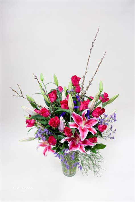 A Tropical Rose Vase Arrangement Loveland Flower Delivery Earles