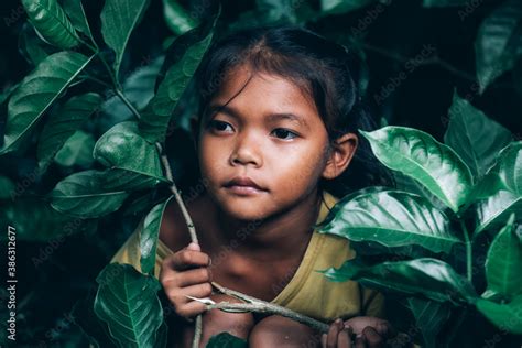 An 8 Year Old Thai Poor Girl Is Lovely In A Homeless Neighborhood Foto De Stock Adobe Stock