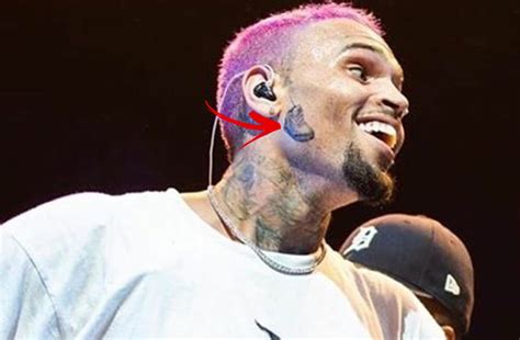Chris Brown Reveals New Tattoo Shoe Image On His Face During Indigo