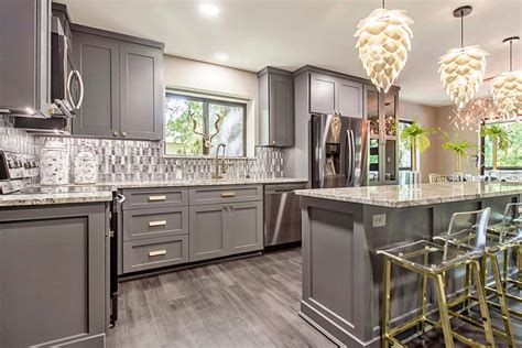 Gray kitchen cabinets provide a gorgeous neutral tone that's easy to match with other elements in your home. 2020 Cost To Paint Kitchen Cabinets | Professional Repaint