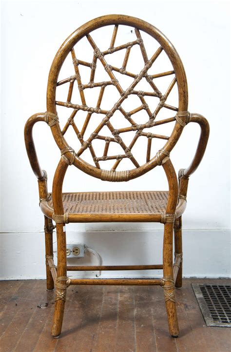 Powell spider web back accent chair, mahogany, soft gold. "Spider Web" Bamboo and Caned Chair at 1stdibs