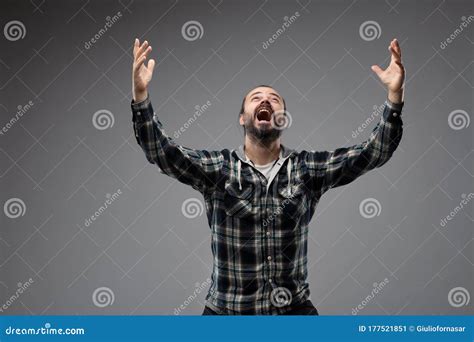 Man In Checked Shirt With His Arms Up Stock Image Image Of Ponytail
