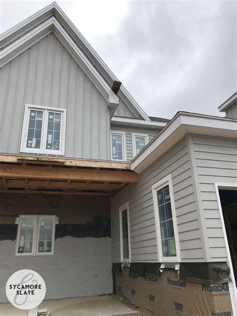 View interior and exterior paint colors and color palettes. building a house! pretty siding! Color is SW Ellie Gray # ...