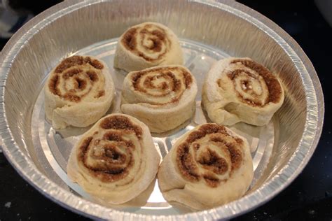 Remove the baking sheet and pie pan from the oven. How to Par-Bake Cinnamon Rolls | Baked Broiled and Basted