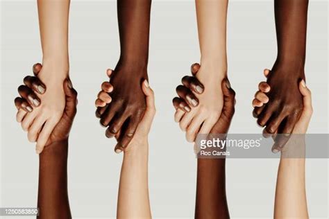 Two Hands Clasped Together Photos And Premium High Res Pictures Getty