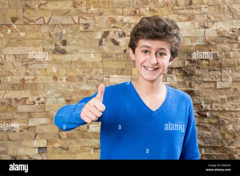 Happy 10 Years Old Boy Showing A Thumbs Up Gesture Stock Photo Alamy