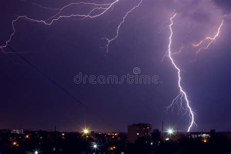 Lightning Storm Over City In Purple Light Stock Image Image Of Nature