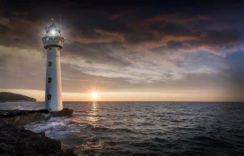 Lighthouse Glow Evening Sunset Ocean Sea Horizon Distant