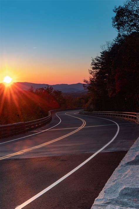Download Wallpaper 800x1200 Road Turn Trees Rays Sunset Iphone 4s4