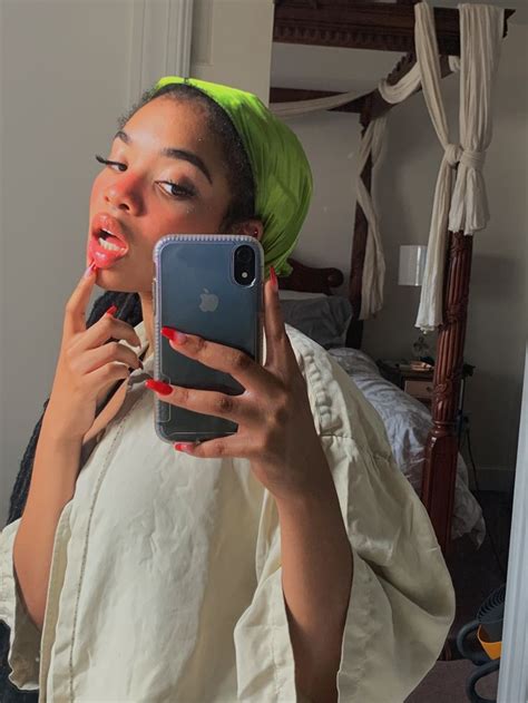 Her daughter's mane is growing lighter over time, but she still has mounds of hair, and appears much older than she is. Image by Lil Baby on black hair | Black hair, Mirror ...