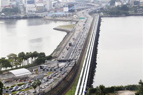 The malaysian daily quoted the country's health minister adham baba as saying that the recovery movement control. The Johor Baru (Malaysia) - Singapore Border | weehingthong