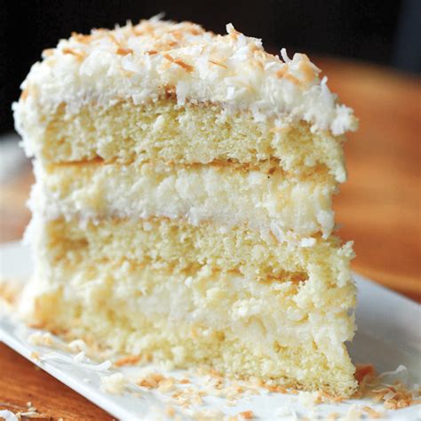 Remove one cake layer from the pan and invert onto a cake plate. fresh coconut cake paula deen