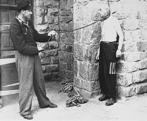 Prisoners Demonstrate A Typical Form Of Punishment Employed By The Ss