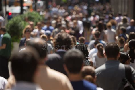Crowd Of People Walking On Street Sidewalk Stock Photo Image Of