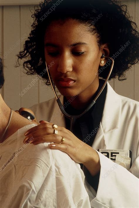 Woman Gp Doctor With Stethoscope Examines A Man Stock Image M9200429 Science Photo Library