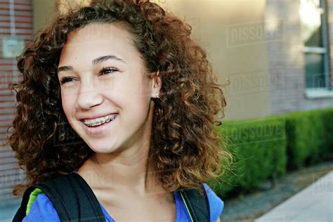 Mixed Race Girl Smiling Stock Photo Dissolve