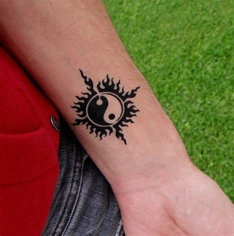 Yin yang tattoos acknowledges chinese philosophy. Yin Yang Tattoos for Men - Ideas and Inspiration for Guys