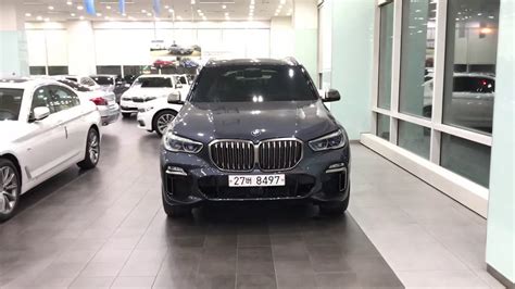 Wear whatever jacket or tie you want, your charcoal dress pants won't mind. BMW X5 M50d Arctic Grey(C27) & Tartufo Seats - YouTube
